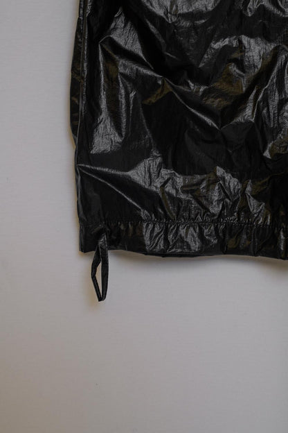 Pantalones metálicos oversized negros de paracaídas