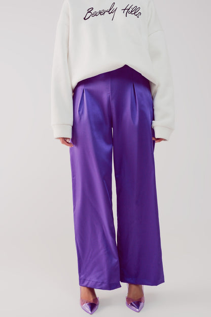 Pantalones morados de pernera ancha de satén