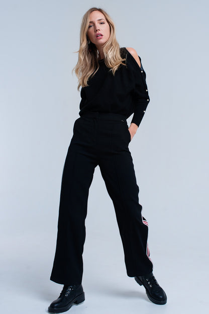 Pantalones negros con detalle de rayas