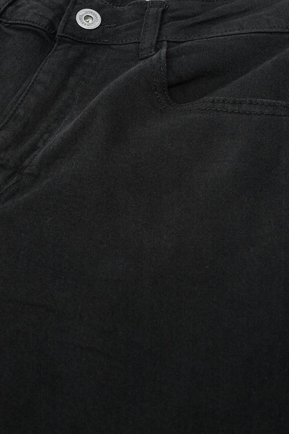 Pantalones negros de cintura alta y pernera ancha