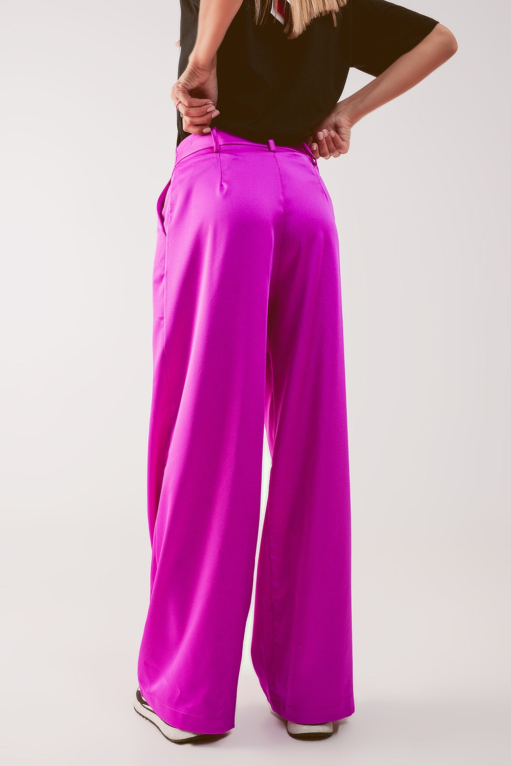 Pantalones palazzo con pinzas en fucsia