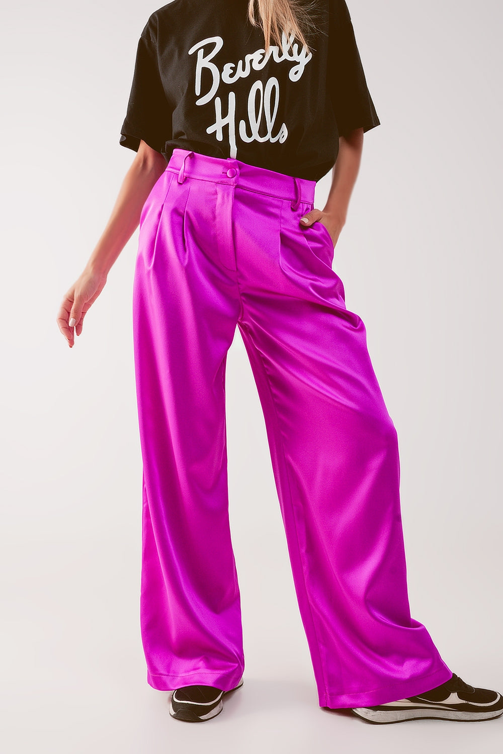 Pantalones palazzo con pinzas en fucsia