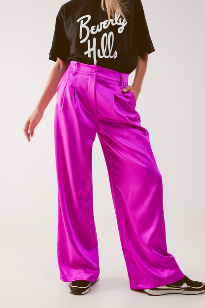 Pantalones palazzo con pinzas en fucsia
