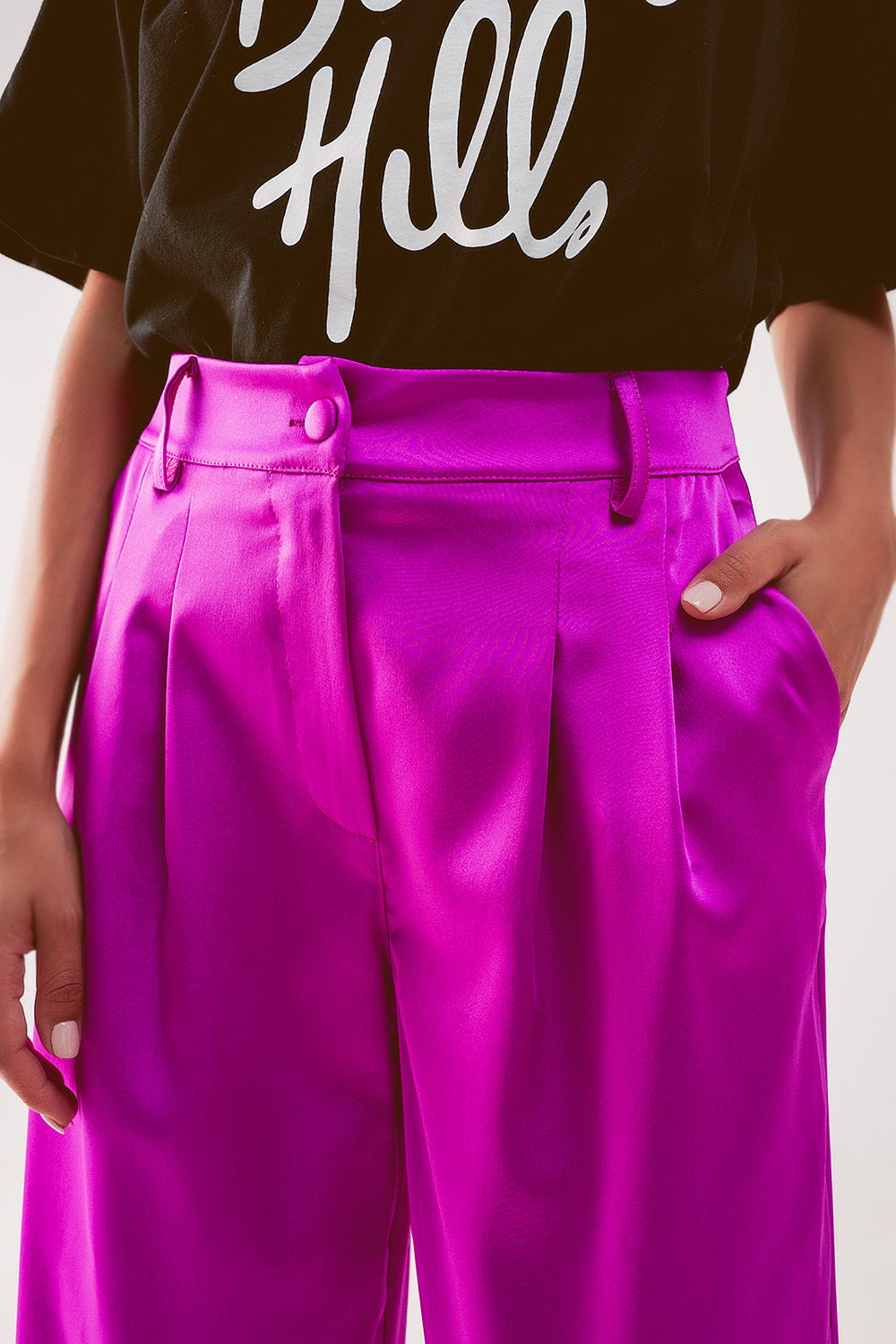 Pantalones palazzo con pinzas en fucsia