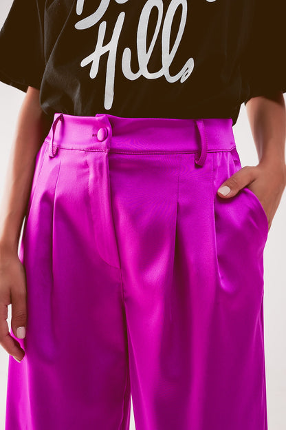 Pantalones palazzo con pinzas en fucsia