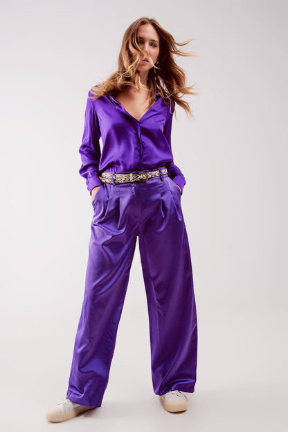 Pantalones palazzo con pinzas en morado