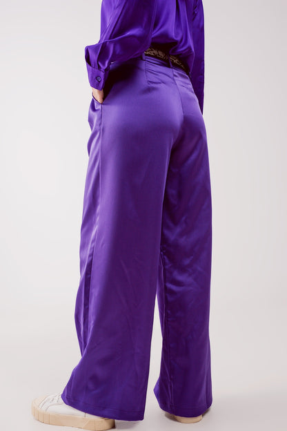 Pantalones palazzo con pinzas en morado