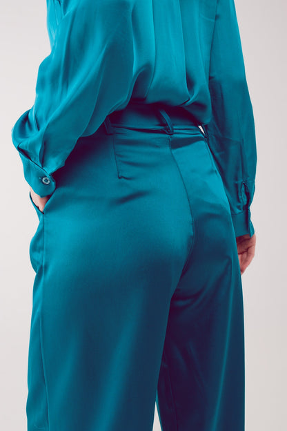 Pantalones palazzo con pinzas en turquesa