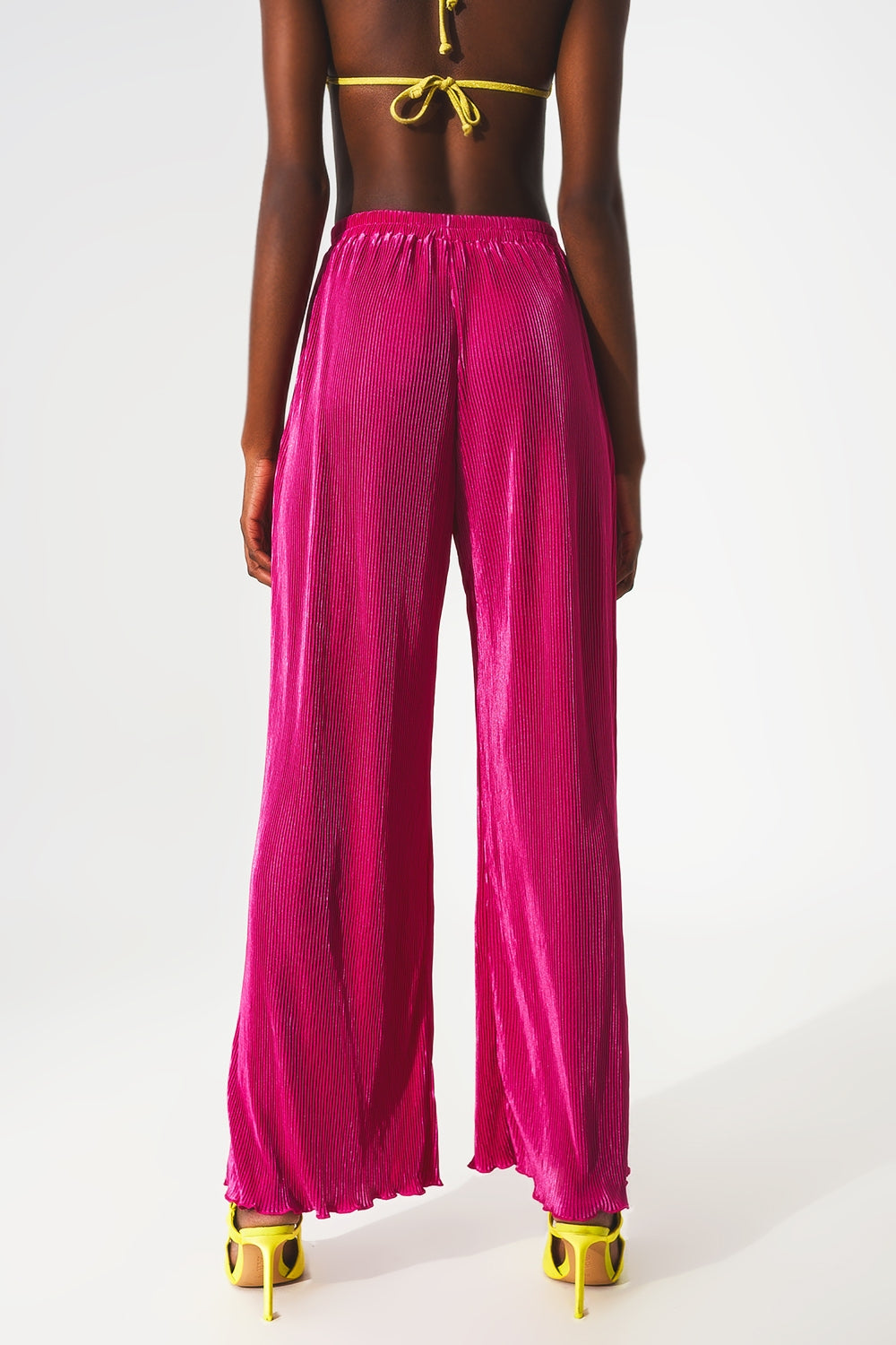 Pantalones plisados de satén fucsia