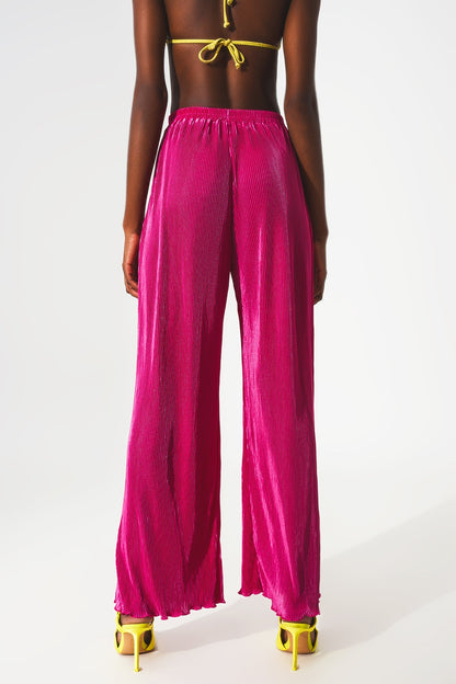 Pantalones plisados de satén fucsia