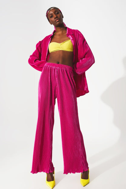 Pantalones plisados de satén fucsia