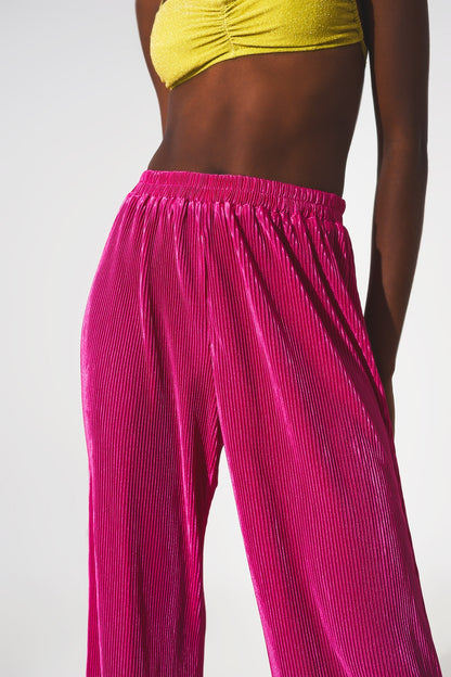 Pantalones plisados de satén fucsia