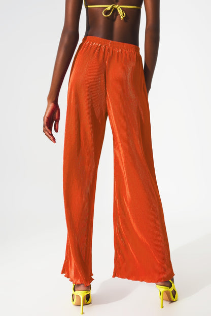 Pantalones plisados de satén naranja