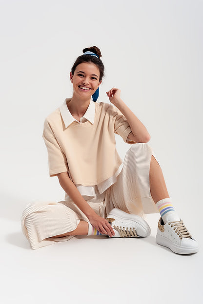 Q2 Pantalones plisados estilo culottes en color crema