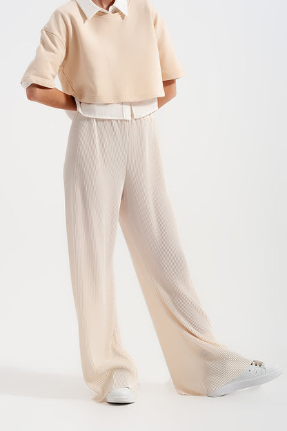 Pantalones plisados estilo culottes en color crema