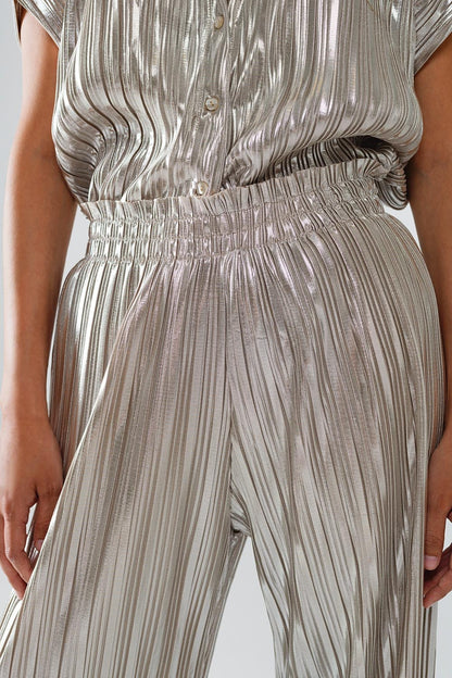 Pantalones plisados plateados con cintura elástica
