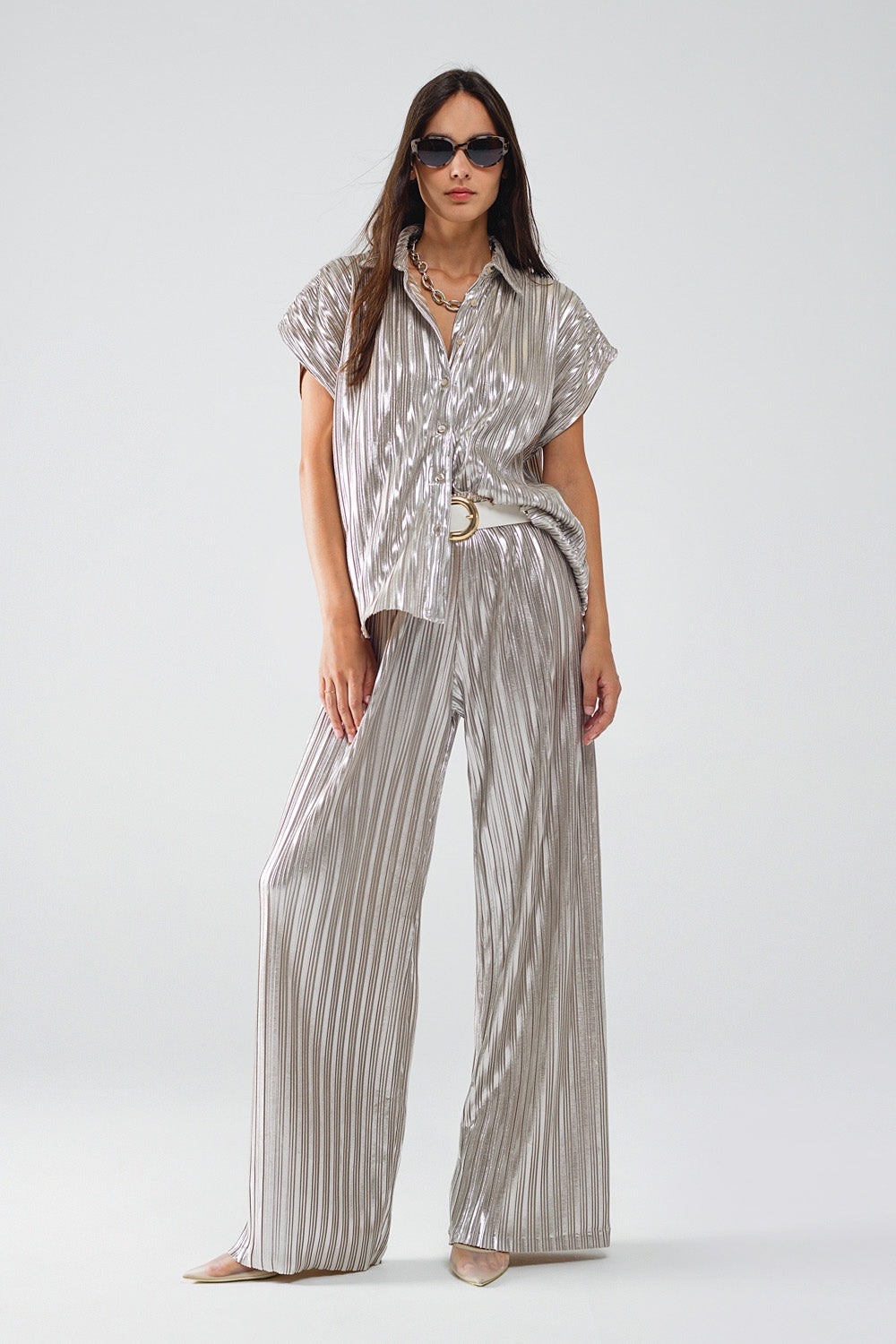 Pantalones plisados plateados con cintura elástica