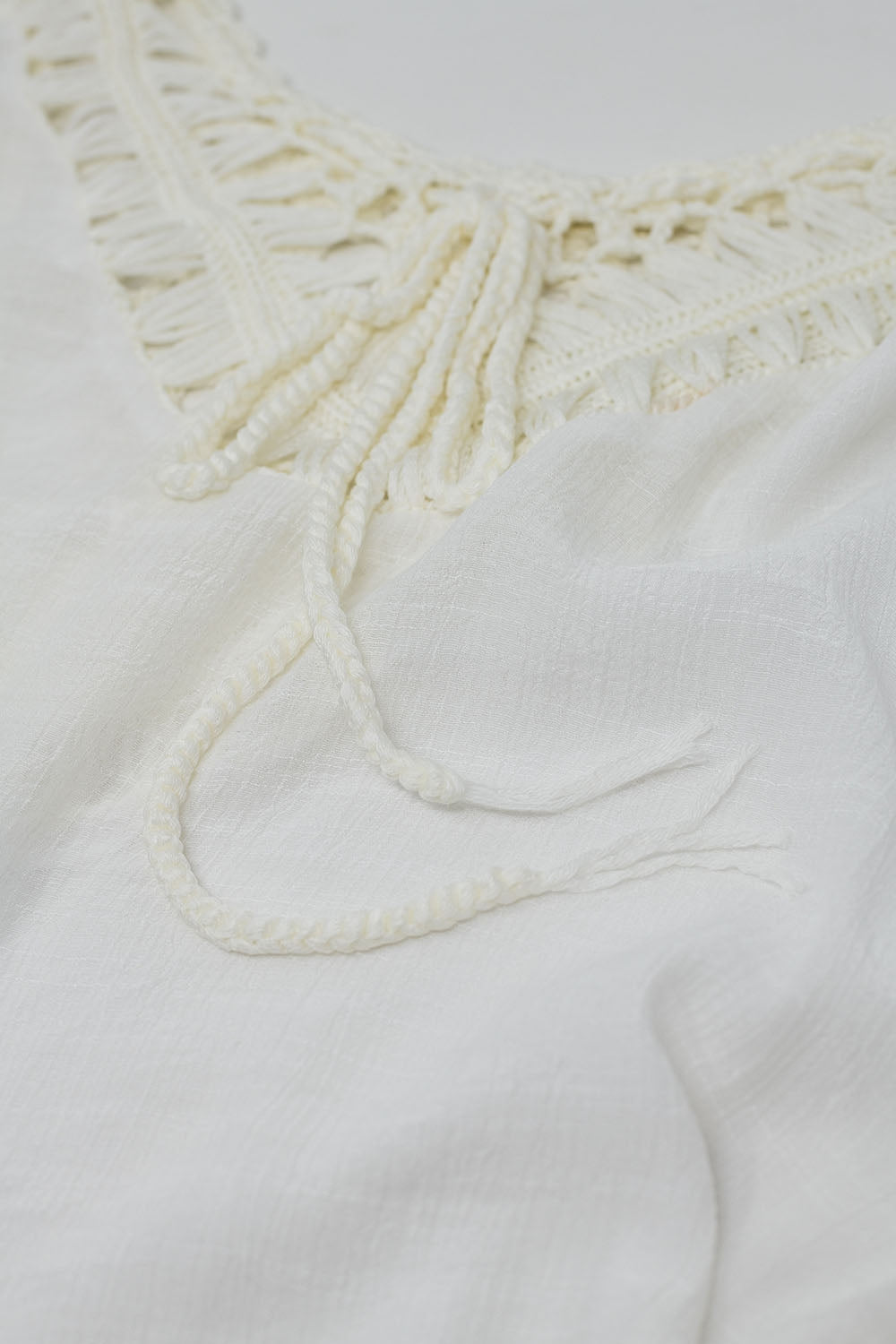 Poncho en crema