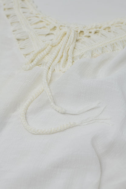 Poncho en crema