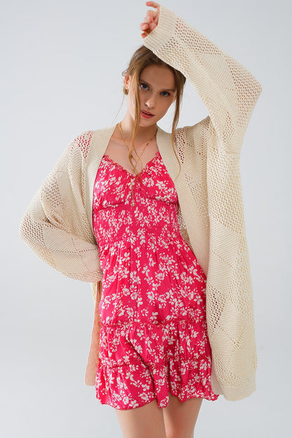 Rebeca beige drapeada con diseño de ganchillo