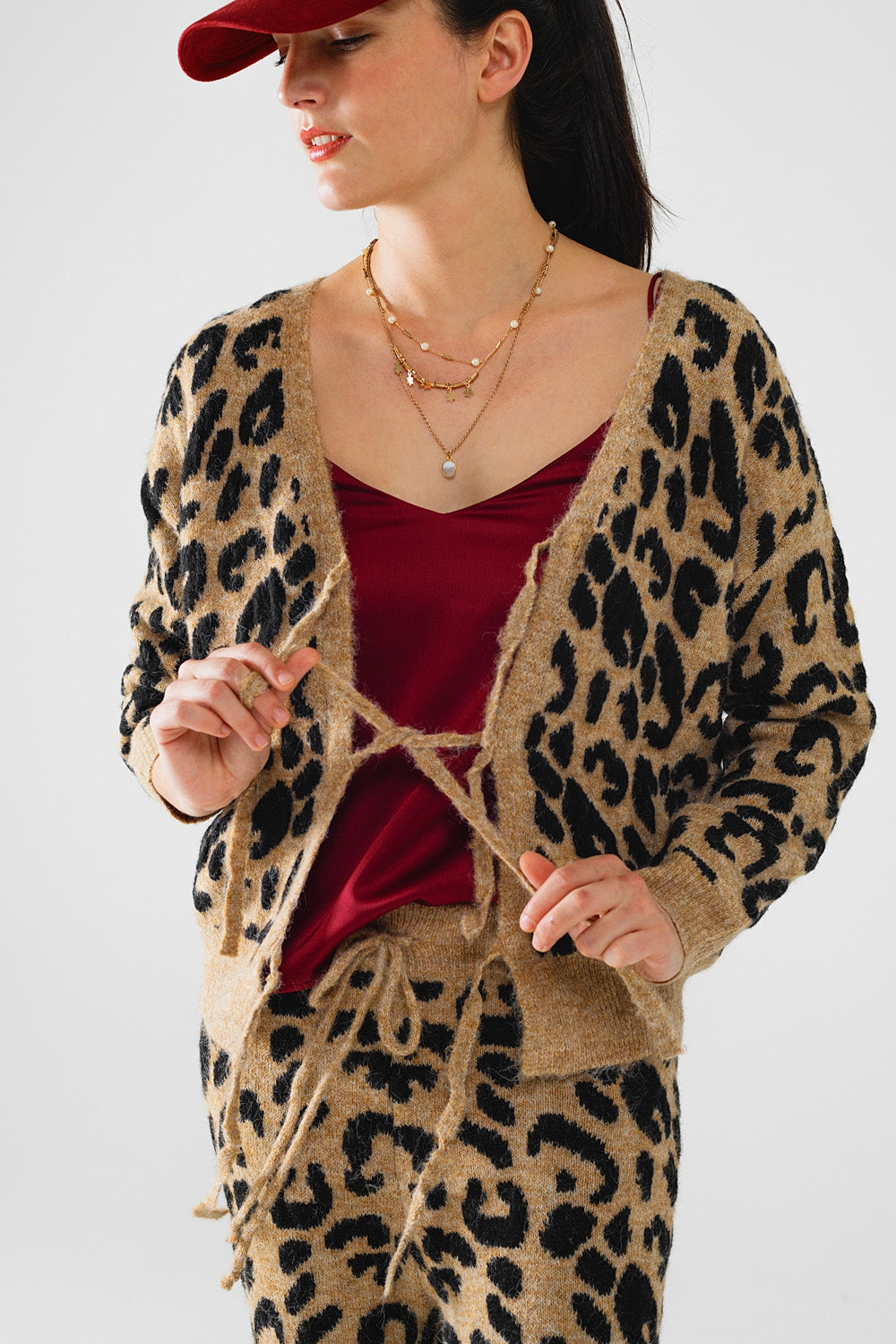 Rebeca de manga larga con estampado de leopardo y detalle de lazos