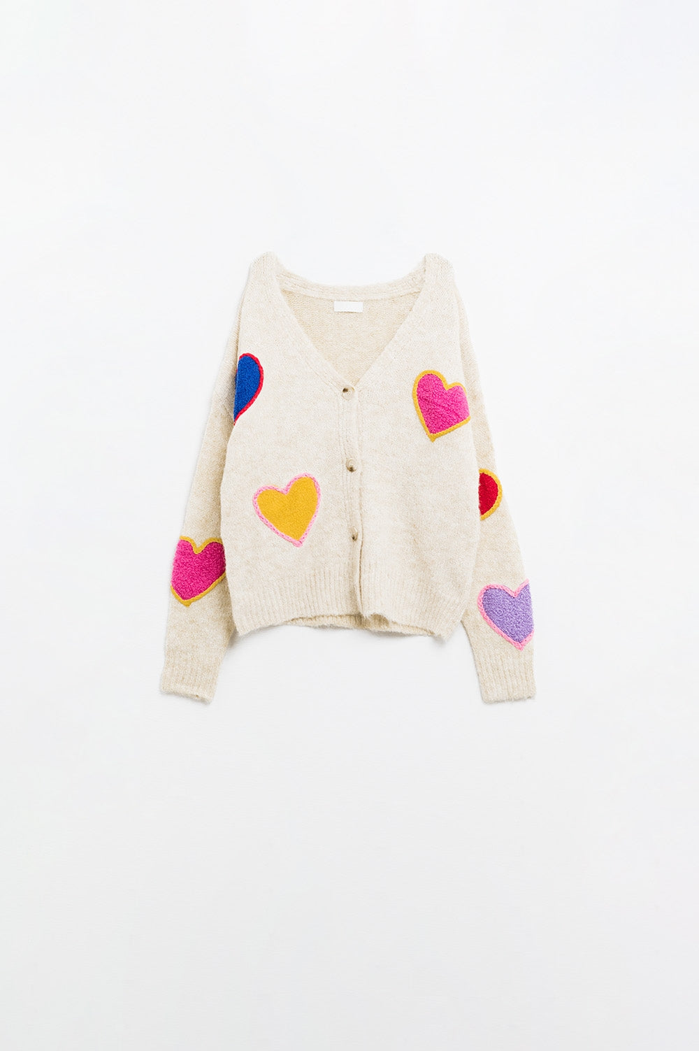 Rebeca de punto beige con corazones bordados