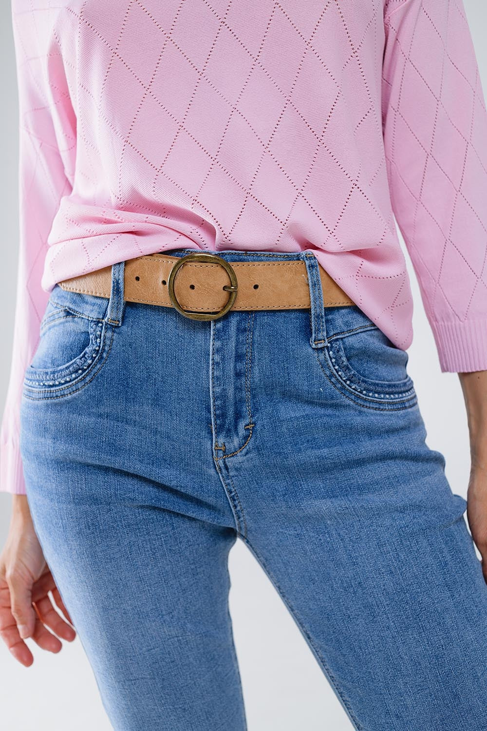Skinny Jeans En lavado claro con detalle en el bolsillo