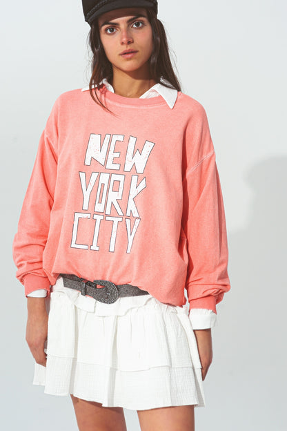 Sudadera con texto de New York City en Coral