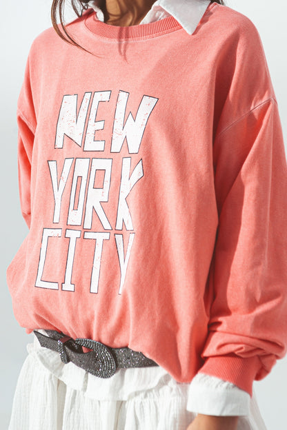 Sudadera con texto de New York City en Coral