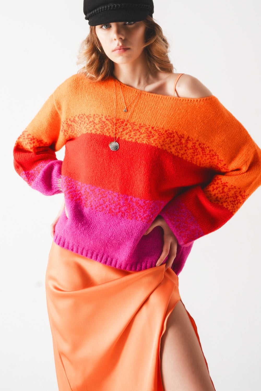 Suéter de punto naranja con rayas mélange