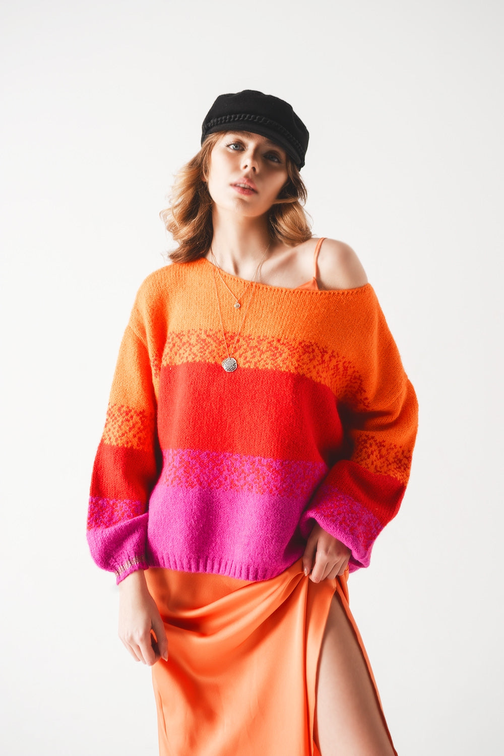 Suéter de punto naranja con rayas mélange