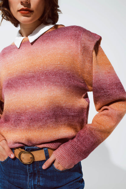 Suéter en diseño degradado naranja y rojo con cuello redondo y detalles en las mangas