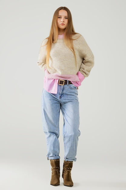 Suéter relajado de rayas en color beige con detalles en rosa