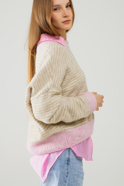 Suéter relajado de rayas en color beige con detalles en rosa