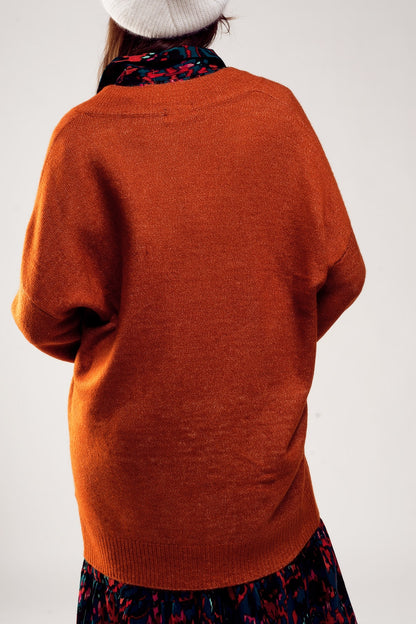Sueter vestido de pico extragrande en color naranja