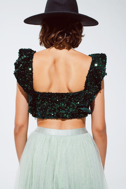 top corto de lentejuelas en verde con tirantes anchos