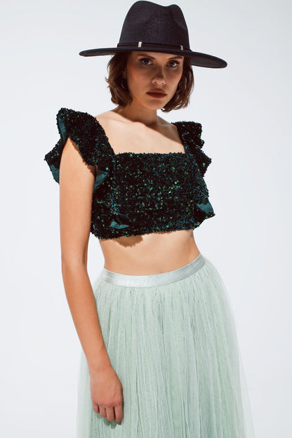 top corto de lentejuelas en verde con tirantes anchos
