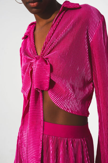 Top plisado anudado al frente en fucsia
