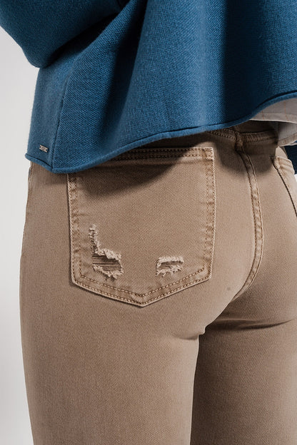 Vaqueros ajustados beige y bajo sin rematar