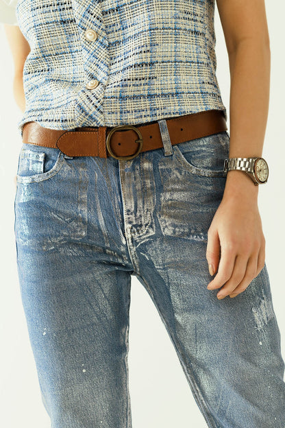 Vaqueros azules skinny con acabado metalizado en lavado claro
