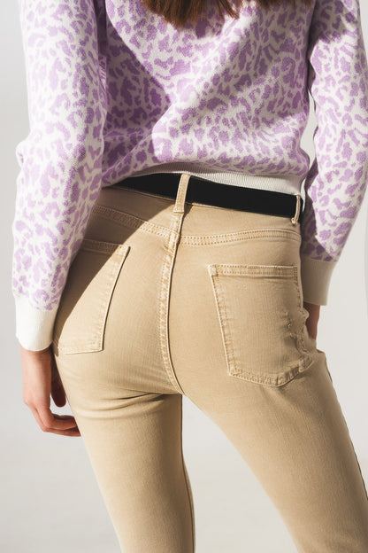 Vaqueros beige de talle alto y corte pitillo