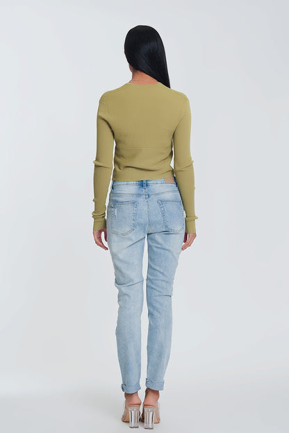 Vaqueros Boyfriend azul claro con detalles desgarrados