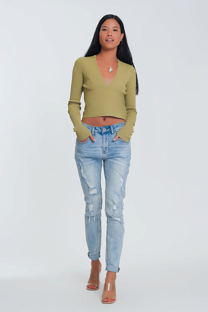 Vaqueros Boyfriend azul claro con detalles desgarrados