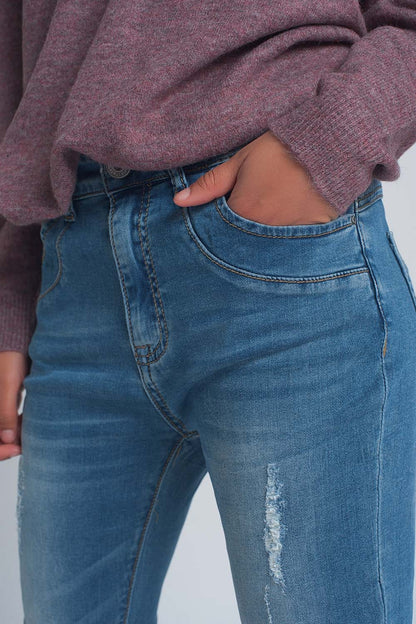 Vaqueros boyfriend de tejido fino con roturas y lavado medio