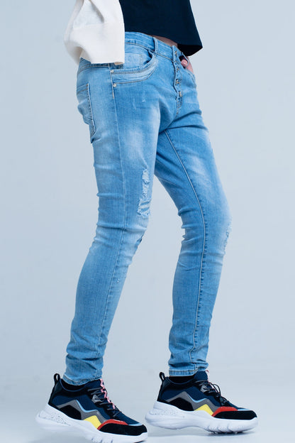 Vaqueros boyfriend rasgados con botones
