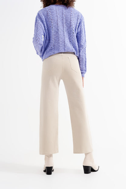 Vaqueros capri color beige de pernera ancha
