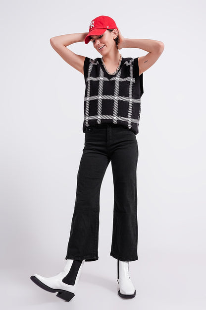 Vaqueros capri color negro de pernera ancha