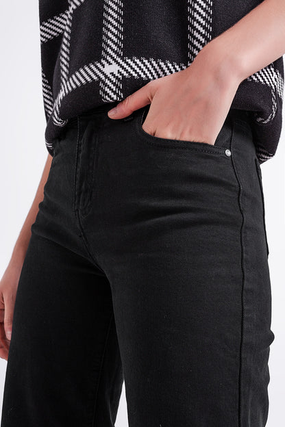 Vaqueros capri color negro de pernera ancha