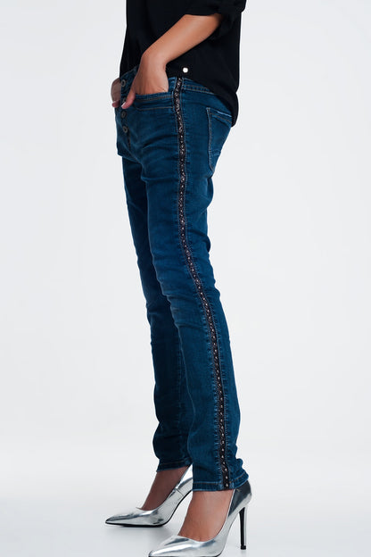 Vaqueros con tachuelas con tira lateral polipiel