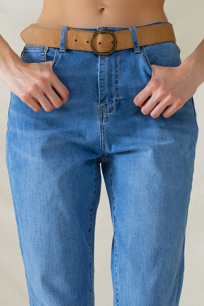Vaqueros de cintura alta en denim elástico de lavado medio